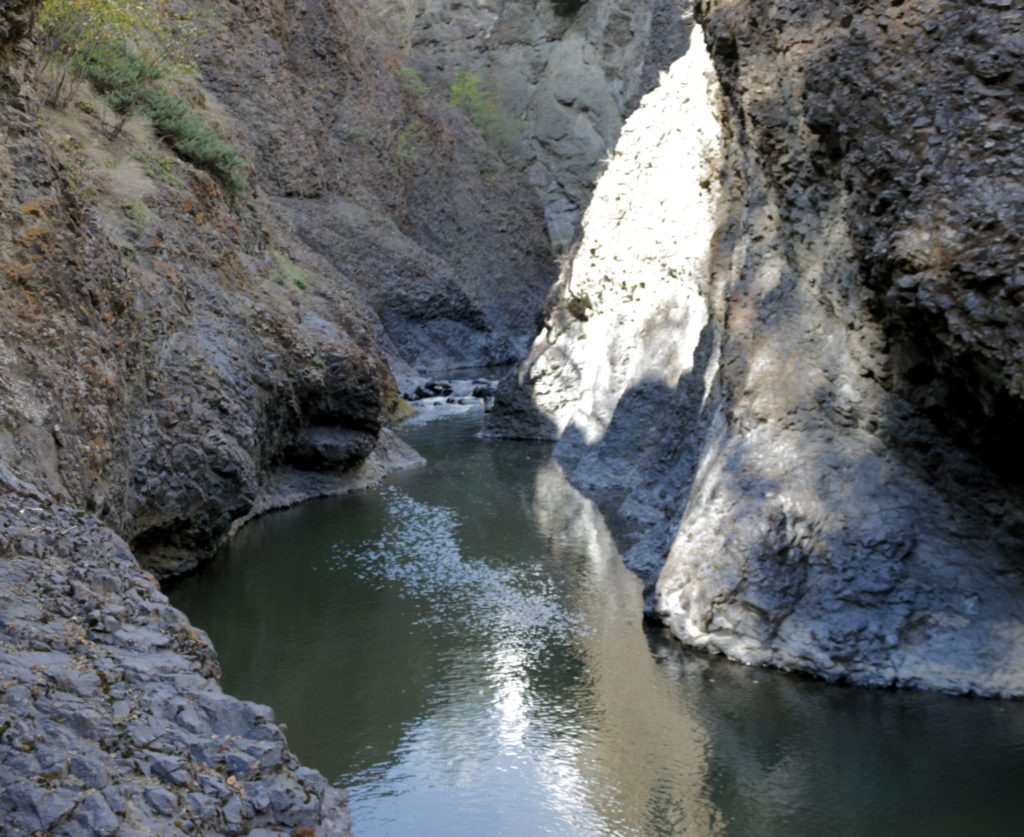 A river with steep cliffs on either side