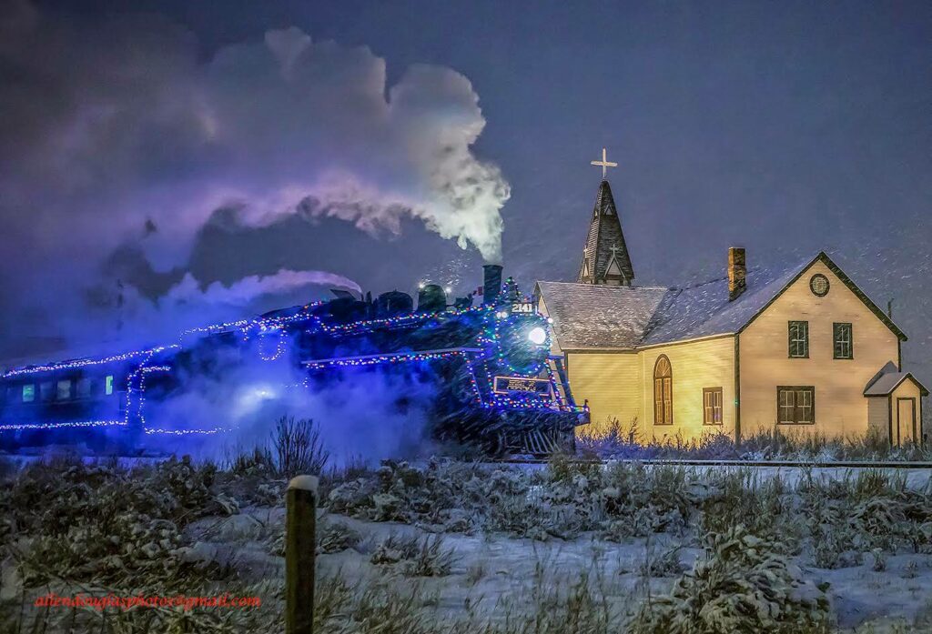 Misty vision of the 2141 holiday train chugging along St. Joseph's church