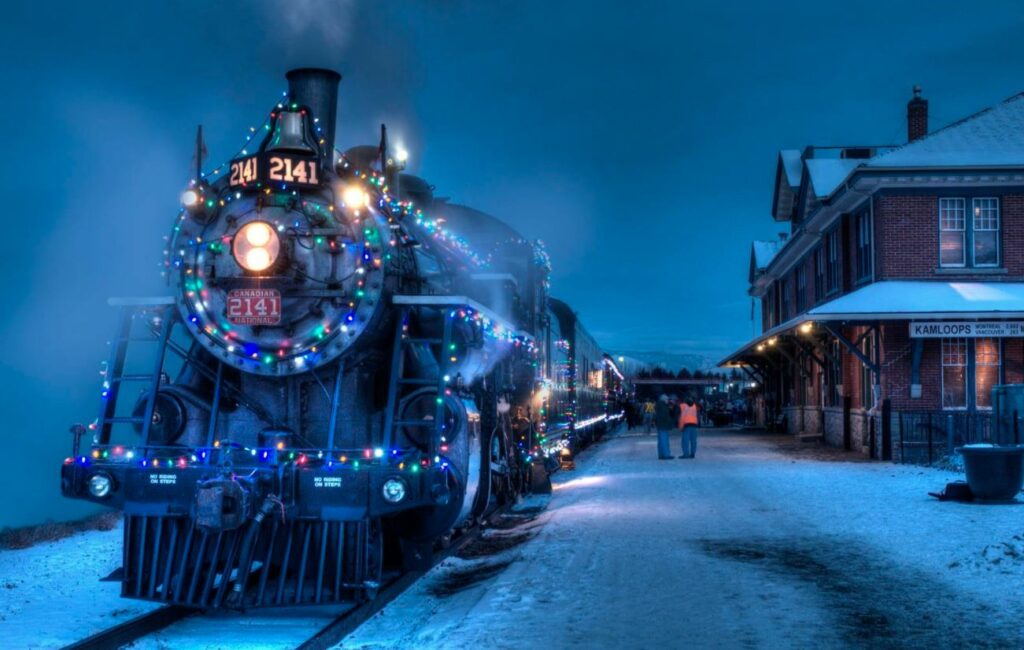 2141 steam locomotive decorated with holiday lights
